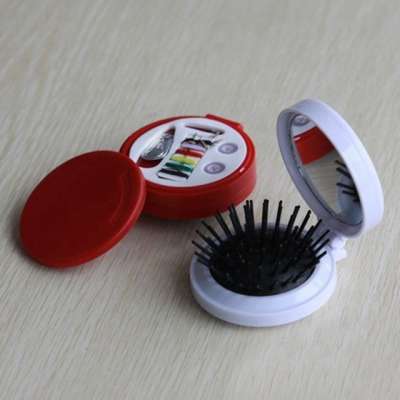 compact travel hair brush sewing kit with mirror